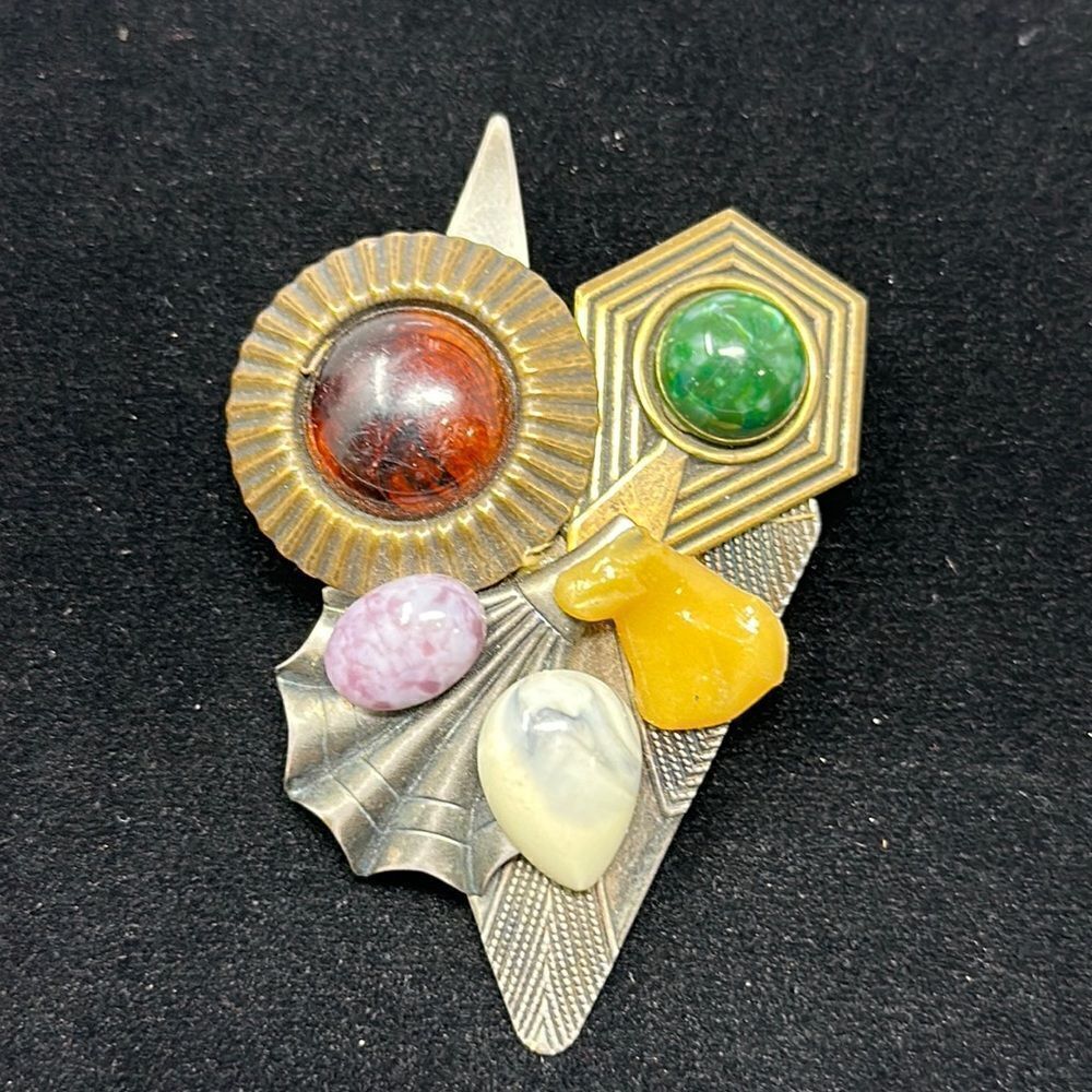 Unique different metal and stones brooch